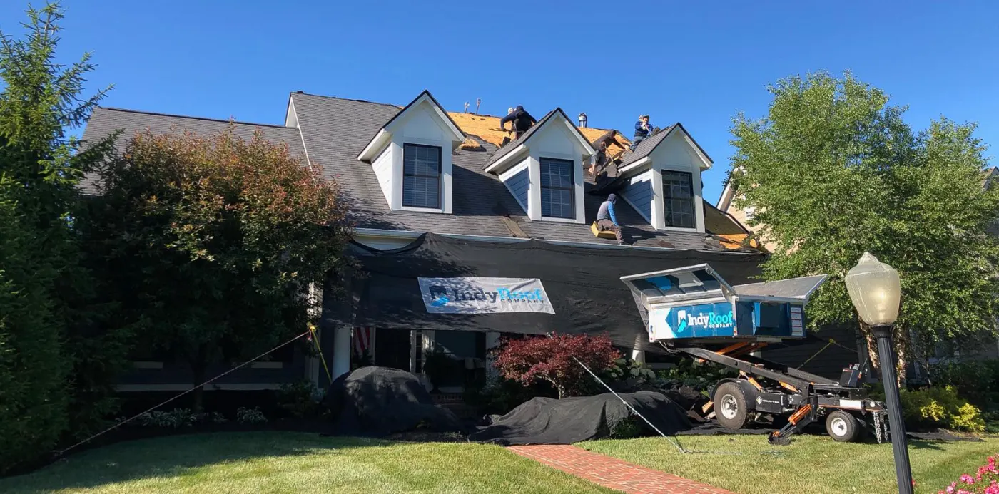 Tarping and dry-in on a Fortville commercial roof